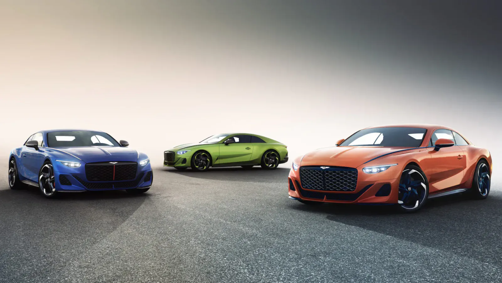 Three Maserati Batur cars in blue, green, and orange showcase Mulliner personalization on a road.