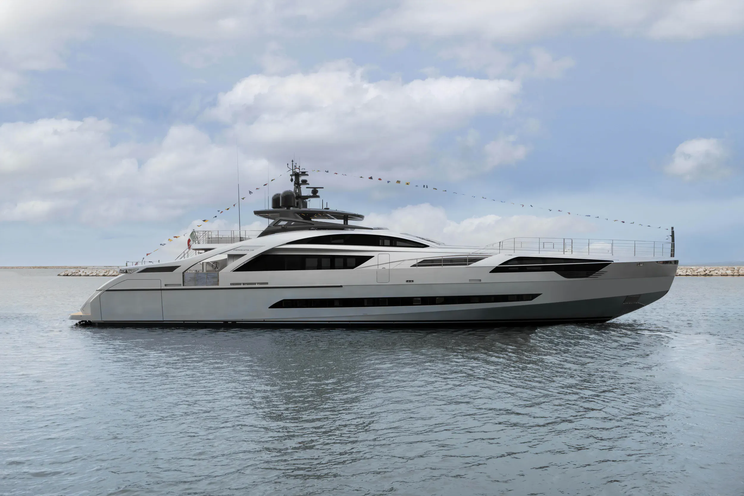 White Pershing flagship superyacht launched at Ancona Super Yacht Yard, docked on calm water under partly cloudy sky.