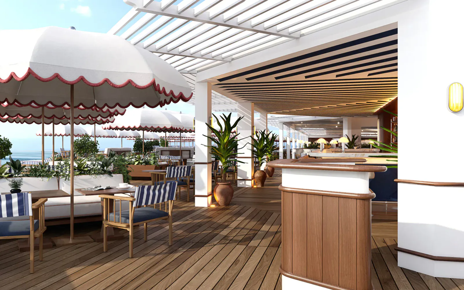 Le Ciro's Restaurant at Hotel Barrière Le Majestic Cannes: elegant outdoor terrace bar with white umbrellas, blue chairs, plants, and sea view.